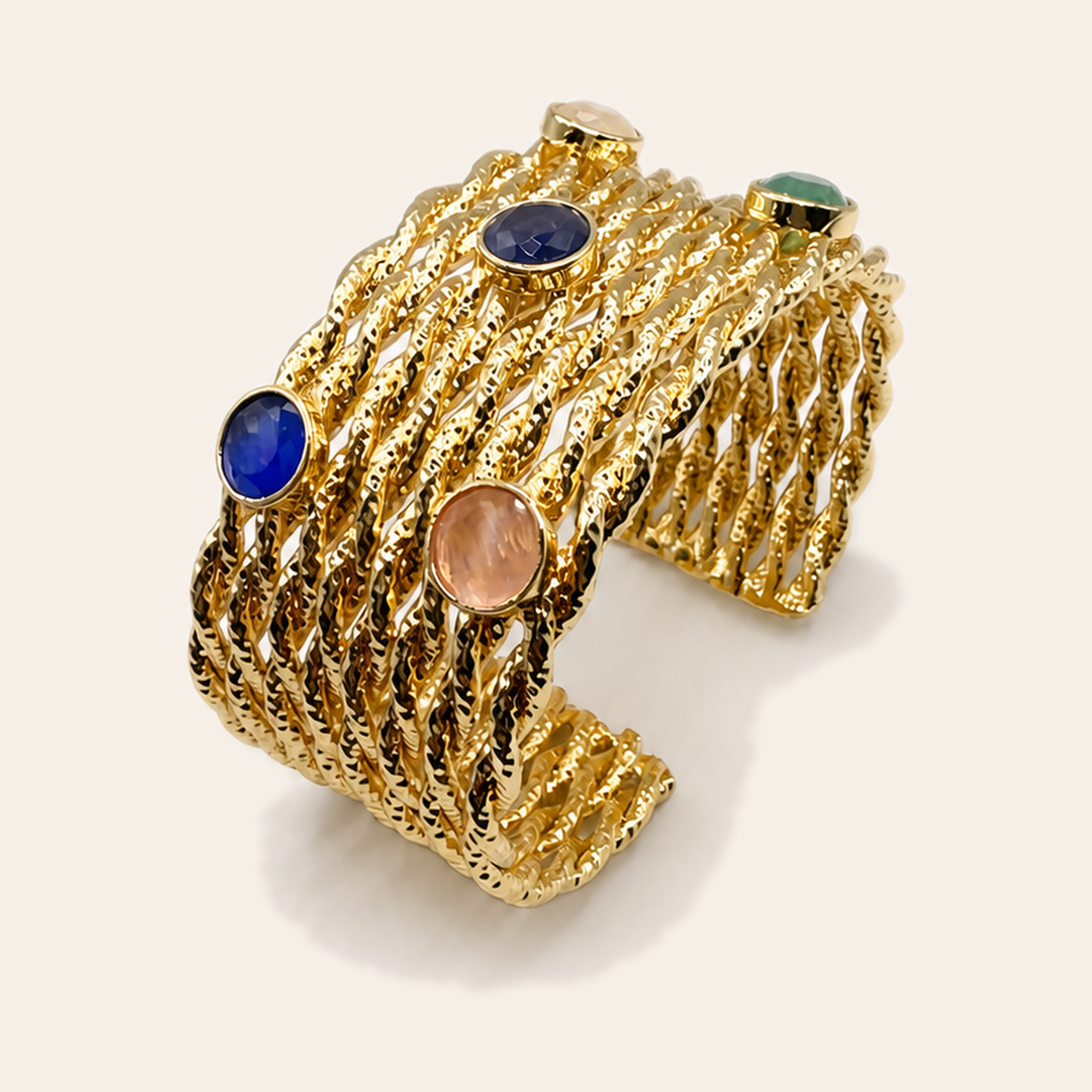 Gold woven gem net cuff with blue, green and blush stones